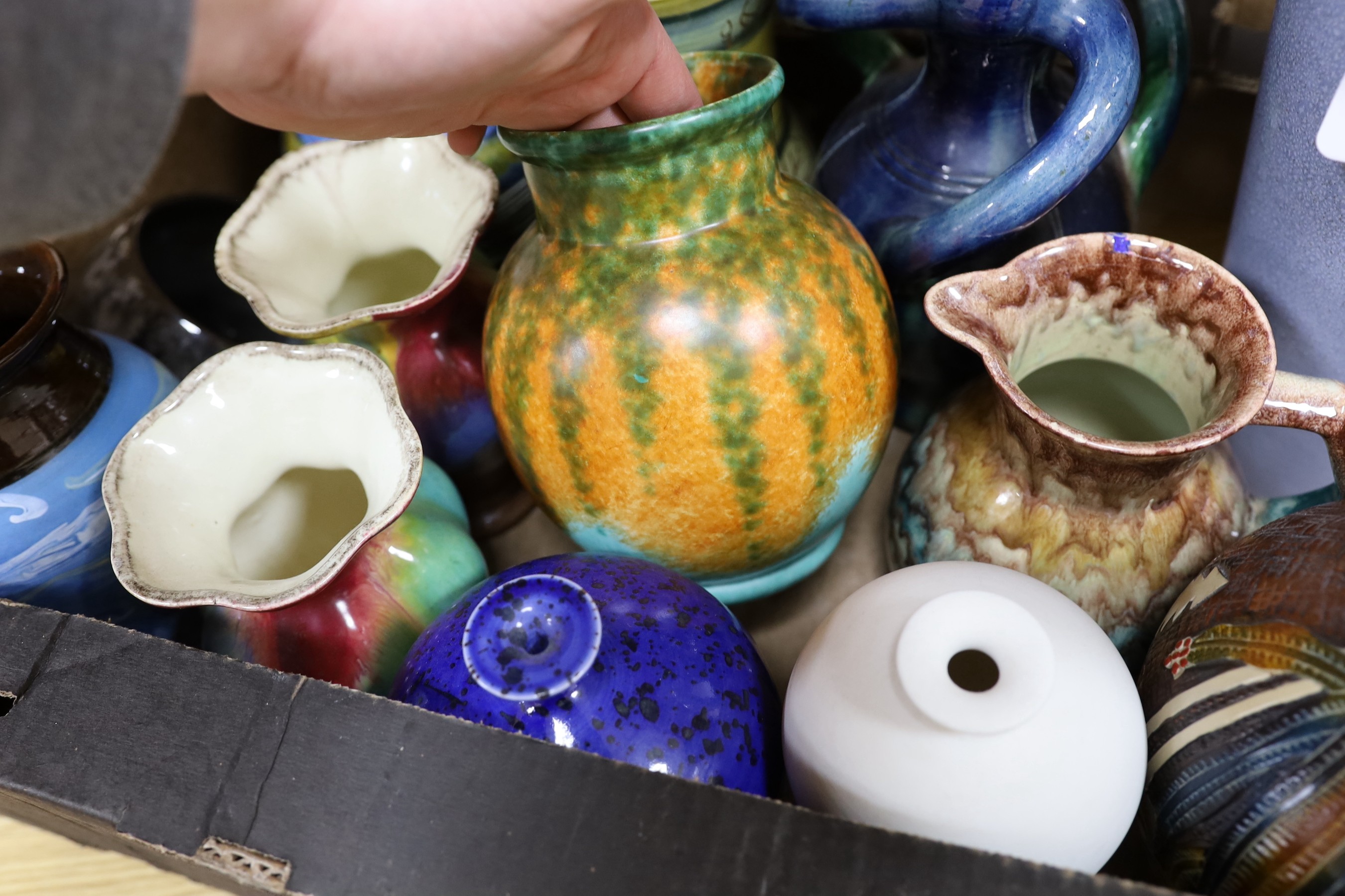 A collection of mixed continental pottery vases